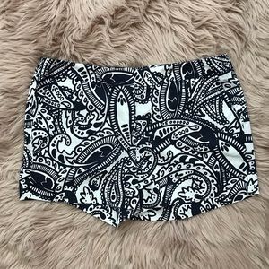 White and navy blue printed shorts
